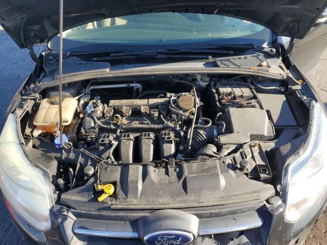 Photo 11 from auction – 2014 FORD FOCUS SE with VIN 1FADP3F27EL413391