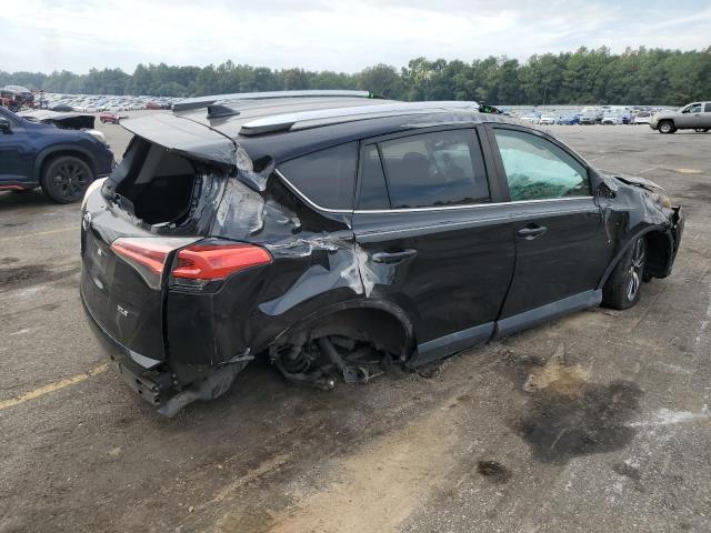 Photo 3 from auction – 2016 TOYOTA RAV4 XLE with VIN 2T3WFREV5GW298567