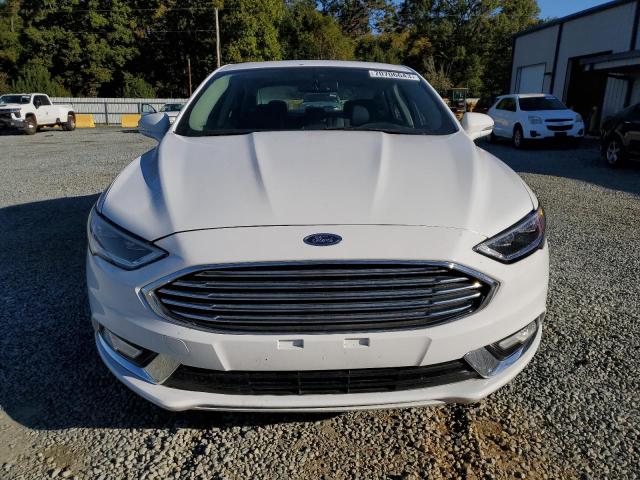 Photo 5 from auction – 2018 FORD FUSION TIT with VIN 3FA6P0D90JR137736