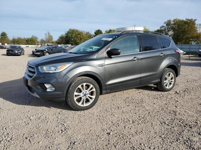 FORD ESCAPE SE 2017 with VIN 1FMCU9G99HUC92063 - Photo from auction