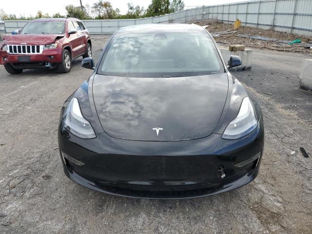 Photo 5 from auction – 2021 TESLA MODEL 3 with VIN 5YJ3E1EC7MF061120