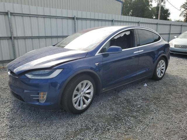 TESLA MODEL X 2017 with VIN 5YJXCBE21HF040175 - Photo from auction
