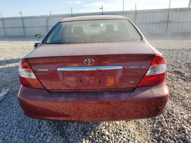 Photo 6 from auction – 2002 TOYOTA CAMRY LE with VIN JTDBF30K320044894
