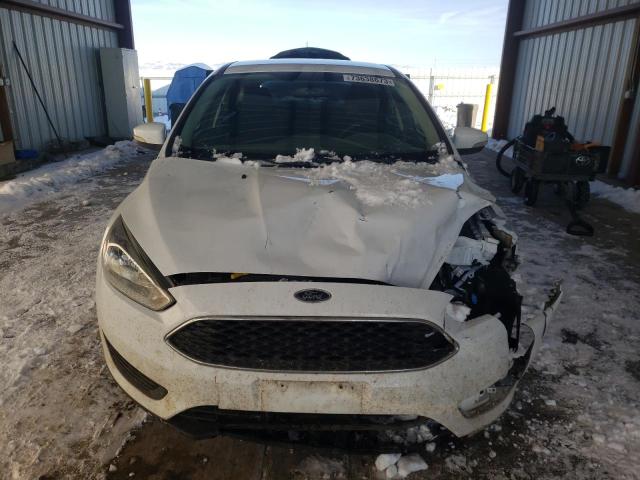 Photo 5 from auction – 2017 FORD FOCUS SE with VIN 1FADP3K21HL290875