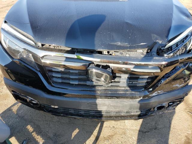 Photo 11 from auction – 2017 HONDA RIDGELINE with VIN 5FPYK3F82HB009010
