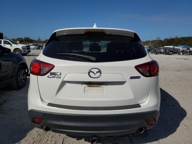 Photo 6 from auction – 2014 MAZDA CX-5 TOURI with VIN JM3KE2CY2E0370971