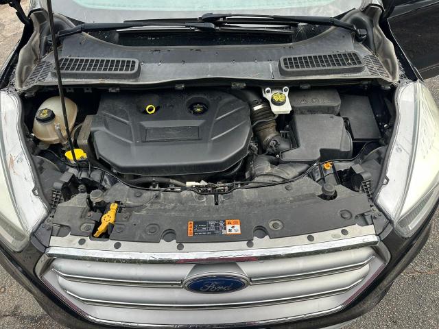 Photo 7 from auction – 2017 FORD ESCAPE SE with VIN 1FMCU9G95HUA28967