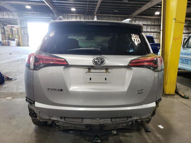 Photo 6 from auction – 2018 TOYOTA RAV4 LE with VIN 2T3BFREV6JW772774