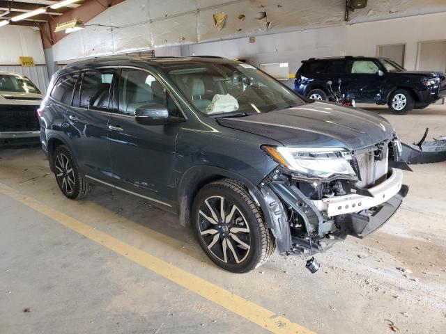 Photo 4 from auction – 2021 HONDA PILOT ELIT with VIN 5FNYF6H00MB083204