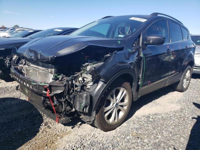 FORD ESCAPE SE 2018 with VIN 1FMCU9GD8JUD15522 - Photo from auction