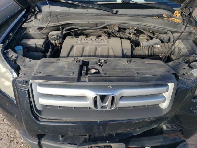 Photo 12 from auction – 2006 HONDA PILOT EX with VIN 2HKYF18666H558429