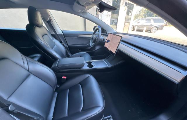 Photo 5 from auction – 2021 TESLA MODEL 3 with VIN 5YJ3E1EA8MF093394