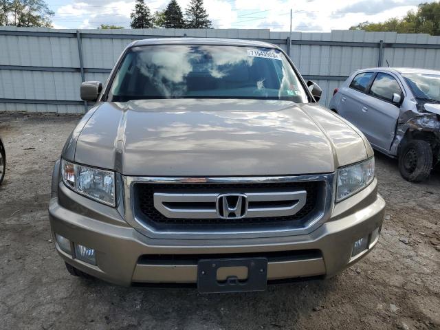 Photo 5 from auction – 2011 HONDA RIDGELINE with VIN 5FPYK1F56BB011151