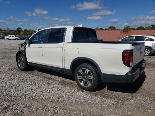 Photo 2 from auction – 2019 HONDA RIDGELINE with VIN 5FPYK2F52KB005966