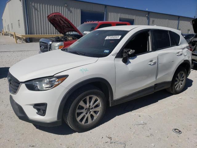MAZDA CX-5 TOURI 2016 with VIN JM3KE2CY6G0612079 - Photo from auction