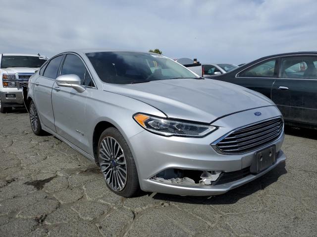 Photo 4 from auction – 2018 FORD FUSION TIT with VIN 3FA6P0RU2JR181735
