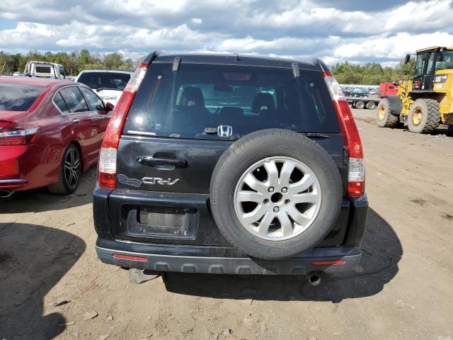 Photo 6 from auction – 2005 HONDA CR-V with VIN JHLRD78915C025621