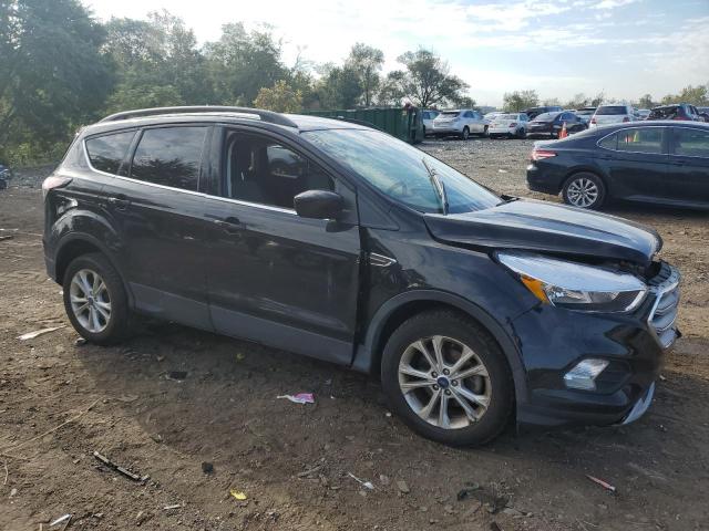Photo 4 from auction – 2018 FORD ESCAPE SE with VIN 1FMCU0GD7JUC77213