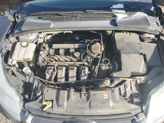 Photo 11 from auction – 2014 FORD FOCUS S with VIN 1FADP3E22EL199198