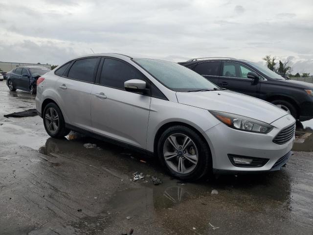 Photo 4 from auction – 2016 FORD FOCUS SE with VIN 1FADP3FE0GL395832