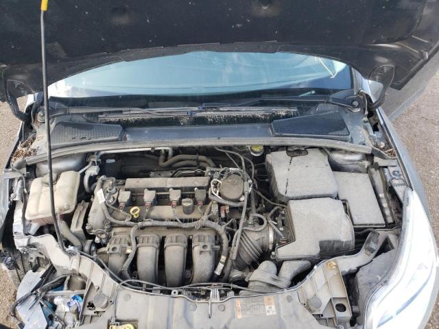 Photo 11 from auction – 2014 FORD FOCUS SE with VIN 1FADP3F21EL415878