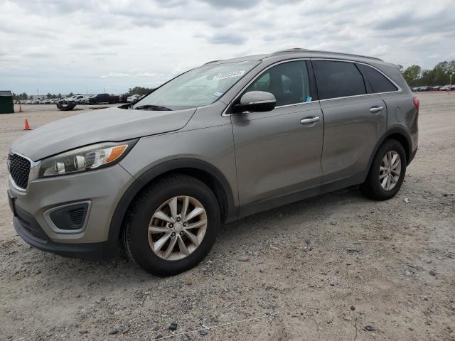 KIA SORENTO LX 2016 with VIN 5XYPG4A32GG046010 - Photo from auction