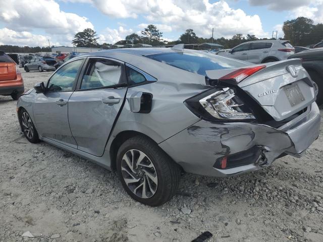 Photo 2 from auction – 2018 HONDA CIVIC EX with VIN 19XFC2F73JE034718
