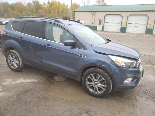Photo 4 from auction – 2018 FORD ESCAPE SE with VIN 1FMCU0GD3JUB51379