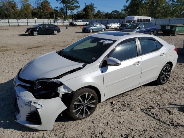 TOYOTA COROLLA L 2017 with VIN 5YFBURHE3HP734330 - Photo from auction