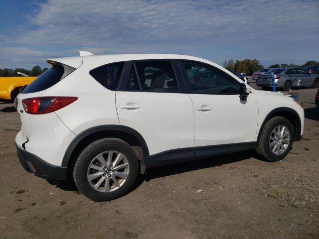 Photo 3 from auction – 2015 MAZDA CX-5 TOURI with VIN JM3KE2CYXF0455963