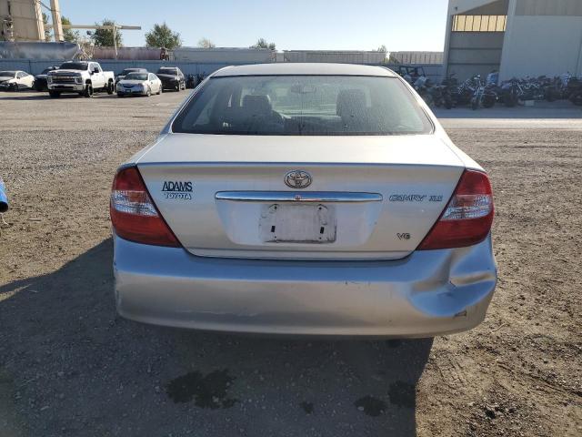 Photo 6 from auction – 2002 TOYOTA CAMRY LE with VIN JTDBF30KX20003341