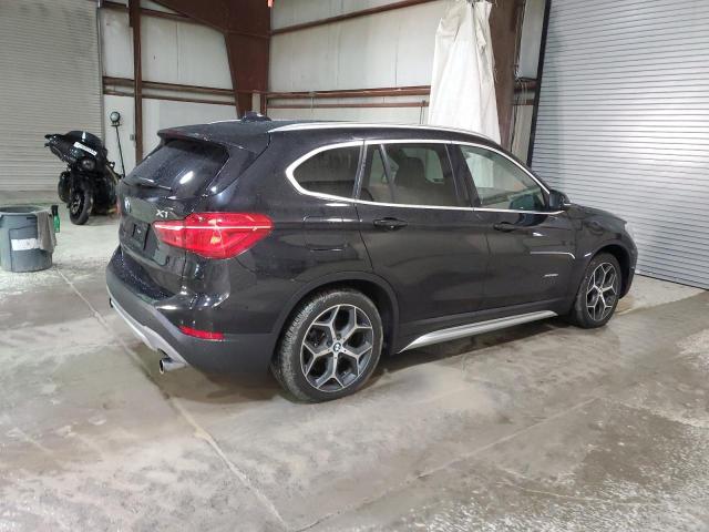 Photo 3 from auction – 2016 BMW X1 XDRIVE2 with VIN WBXHT3C32G5F63829