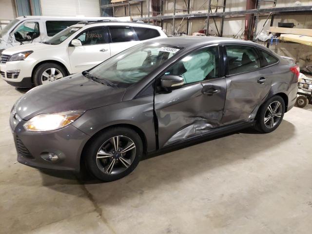 FORD FOCUS SE 2014 with VIN 1FADP3F20EL156011 - Photo from auction