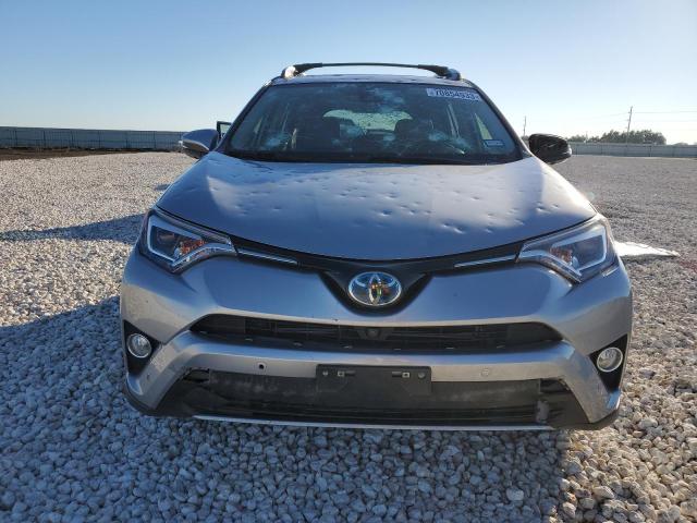 Photo 5 from auction – 2018 TOYOTA RAV4 HV LI with VIN JTMDJREV3JD155367