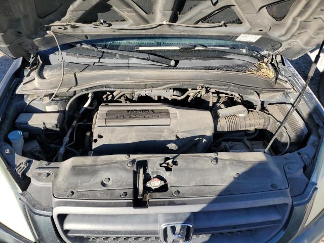Photo 12 from auction – 2004 HONDA PILOT EX with VIN 2HKYF18404H536504