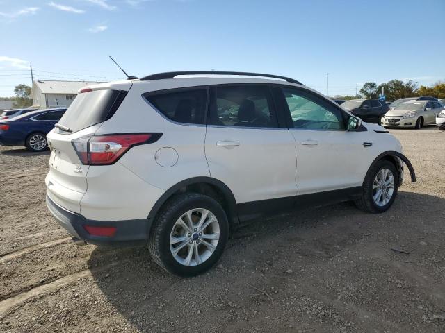 Photo 3 from auction – 2018 FORD ESCAPE SE with VIN 1FMCU9GD6JUC07450