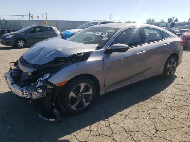 HONDA CIVIC LX 2020 with VIN 19XFC2F66LE027482 - Photo from auction