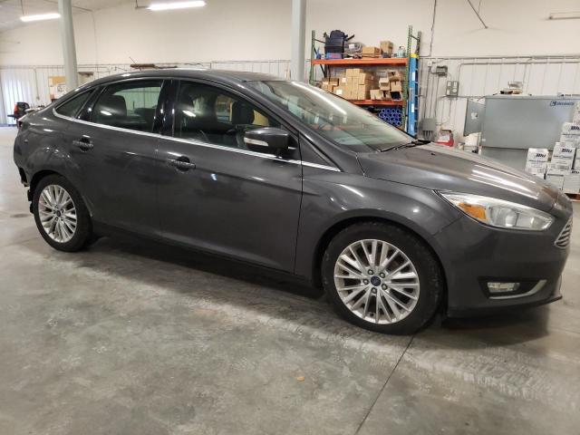 Photo 4 from auction – 2015 FORD FOCUS TITA with VIN 1FADP3J20FL220640