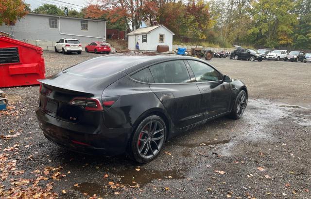 Photo 4 from auction – 2020 TESLA MODEL 3 with VIN 5YJ3E1EC1LF623477