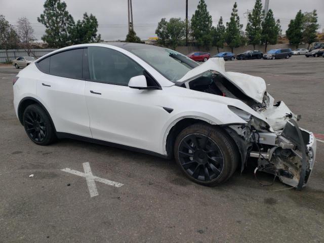 Photo 4 from auction – 2023 TESLA MODEL Y with VIN 7SAYGDEE2PA043406