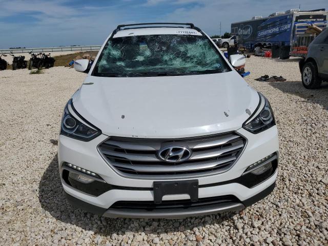 Photo 5 from auction – 2017 HYUNDAI SANTA FE S with VIN 5NMZU3LB9HH017028