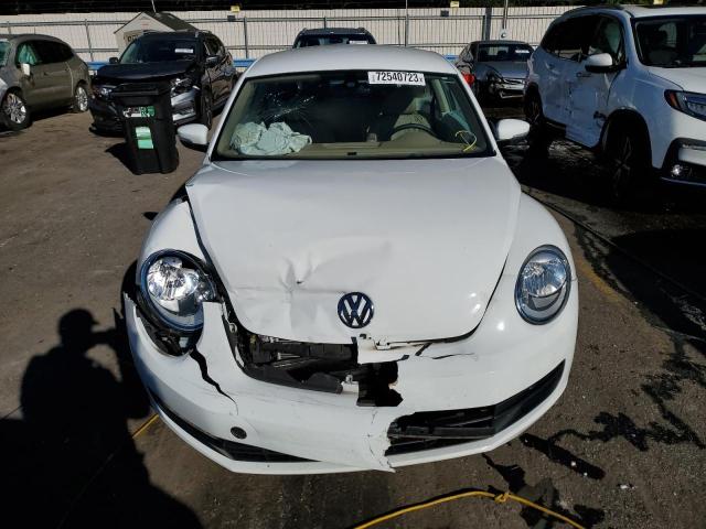Photo 5 from auction – 2016 VOLKSWAGEN BEETLE SE with VIN 3VWJ17AT0GM604526
