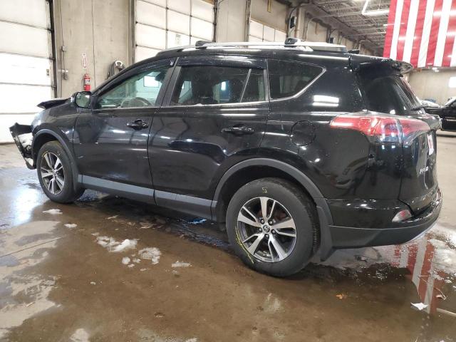 Photo 2 from auction – 2017 TOYOTA RAV4 XLE with VIN 2T3RFREV0HW659797
