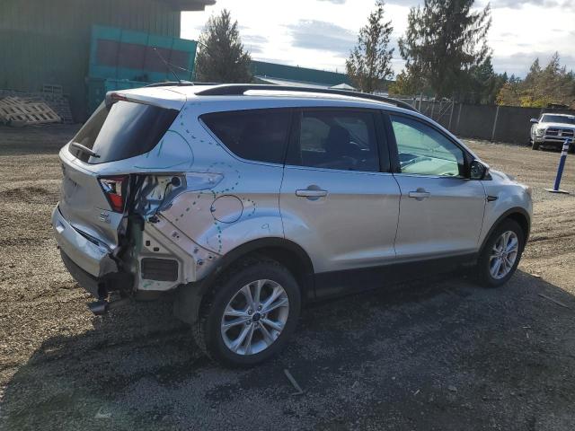 Photo 3 from auction – 2018 FORD ESCAPE SE with VIN 1FMCU9GD8JUA65943