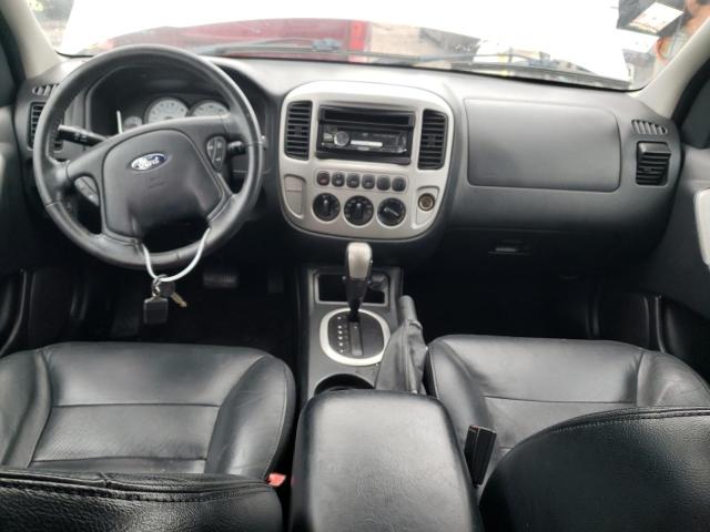 Photo 8 from auction – 2005 FORD ESCAPE LIM with VIN 1FMCU94165KE32527