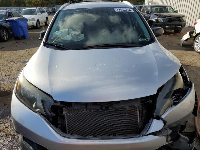 Photo 5 from auction – 2014 HONDA CR-V LX with VIN 5J6RM3H34EL020375
