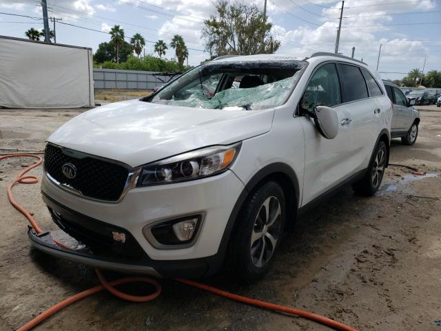 KIA SORENTO EX 2016 with VIN 5XYPH4A16GG046605 - Photo from auction