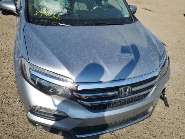 Photo 11 from auction – 2016 HONDA PILOT with VIN 5FNYF6H99GB054772