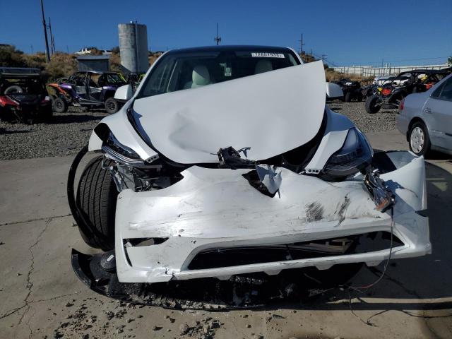 Photo 5 from auction – 2023 TESLA MODEL Y with VIN 7SAYGDEE4PA099752