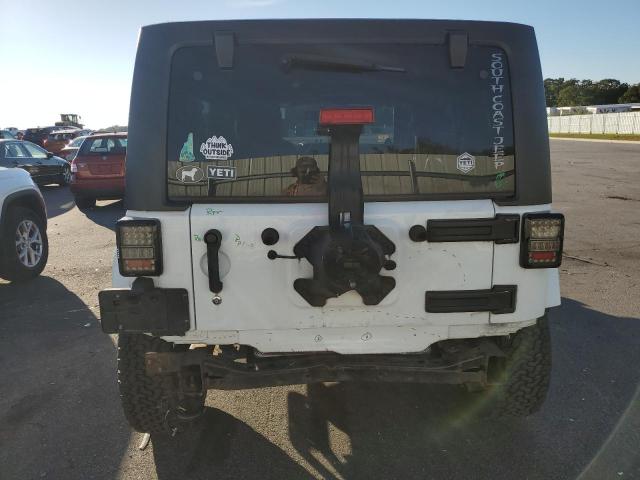 Photo 6 from auction – 2013 JEEP WRANGLER U with VIN 1C4BJWDG0DL617161